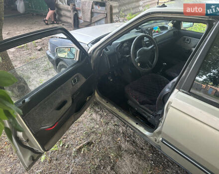 Серый Мазда 323, объемом двигателя 1.32 л и пробегом 153 тыс. км за 1075 $, фото 6 на Automoto.ua