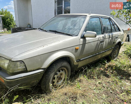 Серый Мазда 323, объемом двигателя 1.3 л и пробегом 200 тыс. км за 1001 $, фото 4 на Automoto.ua