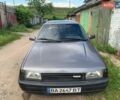 Серый Мазда 323, объемом двигателя 1.3 л и пробегом 203 тыс. км за 700 $, фото 1 на Automoto.ua