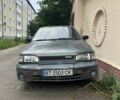 Серый Мазда 323, объемом двигателя 1.32 л и пробегом 342 тыс. км за 1100 $, фото 1 на Automoto.ua
