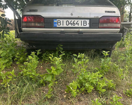 Серый Мазда 323, объемом двигателя 1.32 л и пробегом 153 тыс. км за 1075 $, фото 1 на Automoto.ua