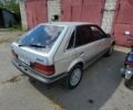 Сірий Мазда 323, об'ємом двигуна 1.3 л та пробігом 210 тис. км за 1700 $, фото 2 на Automoto.ua