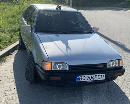 Серый Мазда 323, объемом двигателя 1.32 л и пробегом 460 тыс. км за 1500 $, фото 2 на Automoto.ua