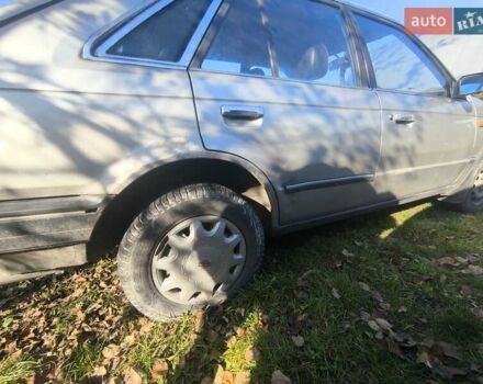 Серый Мазда 323, объемом двигателя 1.3 л и пробегом 212 тыс. км за 300 $, фото 3 на Automoto.ua