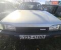 Серый Мазда 323, объемом двигателя 1.3 л и пробегом 212 тыс. км за 300 $, фото 1 на Automoto.ua
