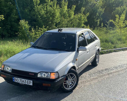 Серый Мазда 323, объемом двигателя 1.32 л и пробегом 460 тыс. км за 1500 $, фото 1 на Automoto.ua