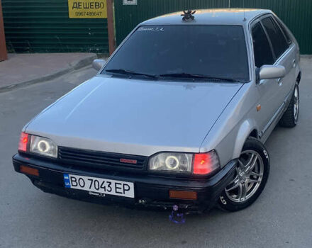 Серый Мазда 323, объемом двигателя 1.32 л и пробегом 460 тыс. км за 1500 $, фото 4 на Automoto.ua