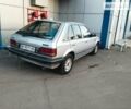 Серый Мазда 323, объемом двигателя 1.4 л и пробегом 300 тыс. км за 1100 $, фото 1 на Automoto.ua