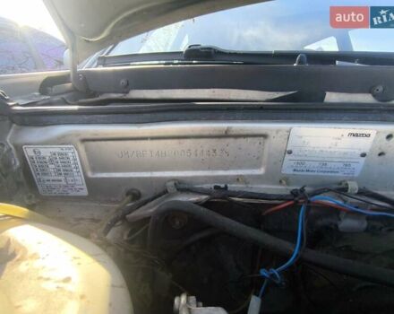 Серый Мазда 323, объемом двигателя 1.3 л и пробегом 212 тыс. км за 300 $, фото 2 на Automoto.ua