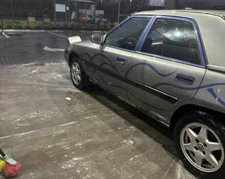 Сірий Мазда 323, об'ємом двигуна 1.8 л та пробігом 350 тис. км за 1400 $, фото 14 на Automoto.ua