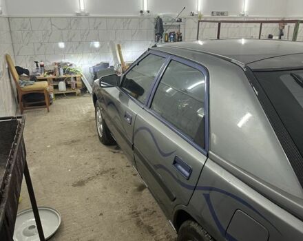 Сірий Мазда 323, об'ємом двигуна 1.8 л та пробігом 350 тис. км за 1400 $, фото 4 на Automoto.ua