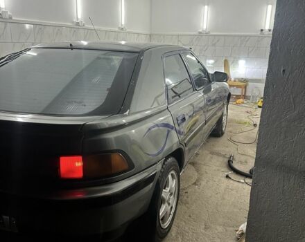 Сірий Мазда 323, об'ємом двигуна 1.8 л та пробігом 350 тис. км за 1400 $, фото 5 на Automoto.ua