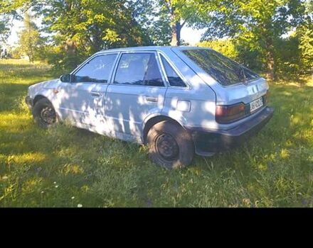 Серый Мазда 323, объемом двигателя 1.3 л и пробегом 222 тыс. км за 200 $, фото 2 на Automoto.ua