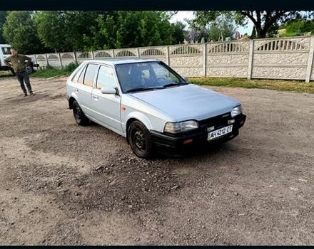 Серый Мазда 323, объемом двигателя 1.3 л и пробегом 222 тыс. км за 200 $, фото 4 на Automoto.ua
