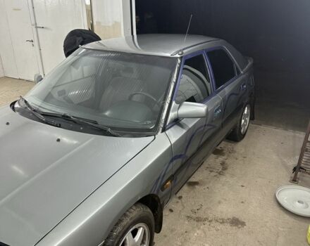 Сірий Мазда 323, об'ємом двигуна 1.8 л та пробігом 350 тис. км за 1400 $, фото 3 на Automoto.ua