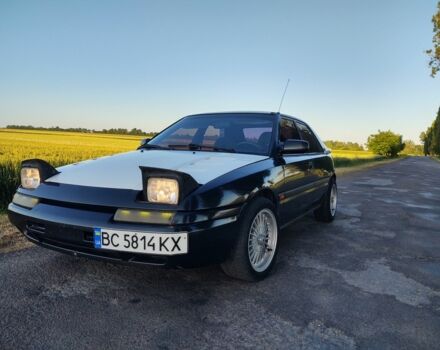 Сірий Мазда 323, об'ємом двигуна 1.8 л та пробігом 350 тис. км за 2350 $, фото 3 на Automoto.ua