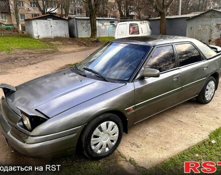 Серый Мазда 323, объемом двигателя 1.6 л и пробегом 220 тыс. км за 1200 $, фото 10 на Automoto.ua