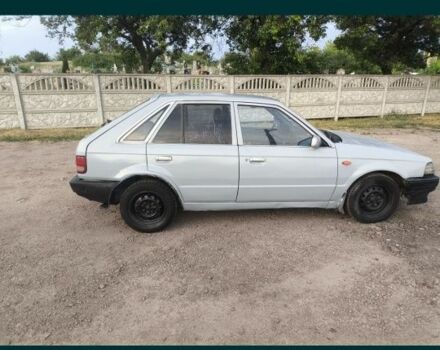 Серый Мазда 323, объемом двигателя 0 л и пробегом 222 тыс. км за 25000 $, фото 2 на Automoto.ua
