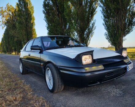 Сірий Мазда 323, об'ємом двигуна 1.8 л та пробігом 350 тис. км за 2350 $, фото 2 на Automoto.ua