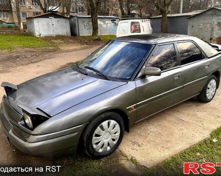 Серый Мазда 323, объемом двигателя 1.6 л и пробегом 220 тыс. км за 1150 $, фото 10 на Automoto.ua