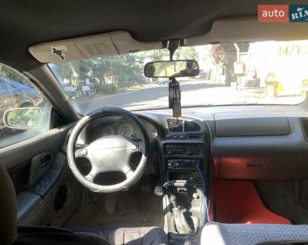 Сірий Мазда 323, об'ємом двигуна 2 л та пробігом 337 тис. км за 2200 $, фото 1 на Automoto.ua
