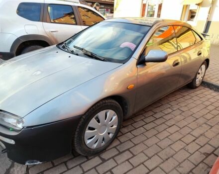 Сірий Мазда 323, об'ємом двигуна 1.5 л та пробігом 293 тис. км за 3000 $, фото 1 на Automoto.ua