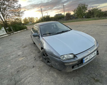 Серый Мазда 323, объемом двигателя 2 л и пробегом 280 тыс. км за 2500 $, фото 4 на Automoto.ua