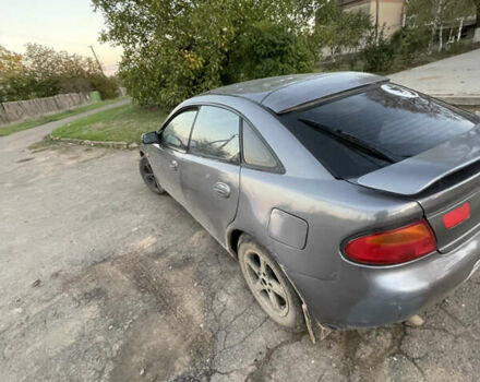 Серый Мазда 323, объемом двигателя 2 л и пробегом 280 тыс. км за 2500 $, фото 2 на Automoto.ua