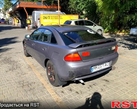 Сірий Мазда 323, об'ємом двигуна 2 л та пробігом 337 тис. км за 2200 $, фото 1 на Automoto.ua