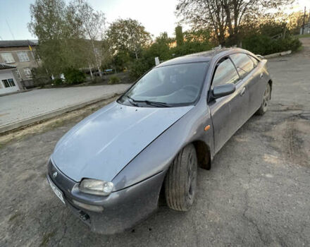 Серый Мазда 323, объемом двигателя 2 л и пробегом 280 тыс. км за 2500 $, фото 5 на Automoto.ua