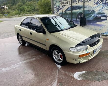 Серый Мазда 323, объемом двигателя 1.5 л и пробегом 1000 тыс. км за 1300 $, фото 2 на Automoto.ua