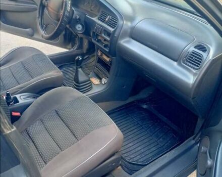 Серый Мазда 323, объемом двигателя 1.49 л и пробегом 300 тыс. км за 2600 $, фото 2 на Automoto.ua