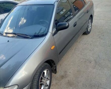 Серый Мазда 323, объемом двигателя 1.49 л и пробегом 300 тыс. км за 2600 $, фото 3 на Automoto.ua