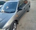 Серый Мазда 323, объемом двигателя 1.49 л и пробегом 300 тыс. км за 2600 $, фото 3 на Automoto.ua