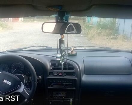 Сірий Мазда 323, об'ємом двигуна 2 л та пробігом 160 тис. км за 2000 $, фото 1 на Automoto.ua