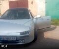 Серый Мазда 323, объемом двигателя 2 л и пробегом 160 тыс. км за 2000 $, фото 1 на Automoto.ua