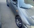 Сірий Мазда 323, об'ємом двигуна 1.49 л та пробігом 300 тис. км за 2600 $, фото 1 на Automoto.ua