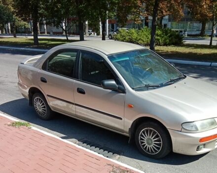 Сірий Мазда 323, об'ємом двигуна 0 л та пробігом 390 тис. км за 2700 $, фото 3 на Automoto.ua