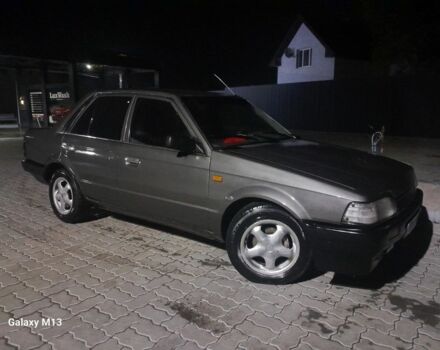 Сірий Мазда 323, об'ємом двигуна 0 л та пробігом 200 тис. км за 710 $, фото 2 на Automoto.ua