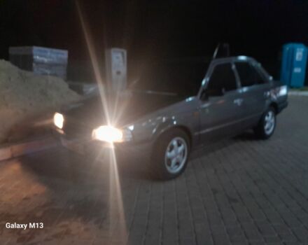 Сірий Мазда 323, об'ємом двигуна 0 л та пробігом 200 тис. км за 710 $, фото 1 на Automoto.ua