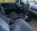 Серый Мазда 323, объемом двигателя 1.8 л и пробегом 5 тыс. км за 1972 $, фото 4 на Automoto.ua