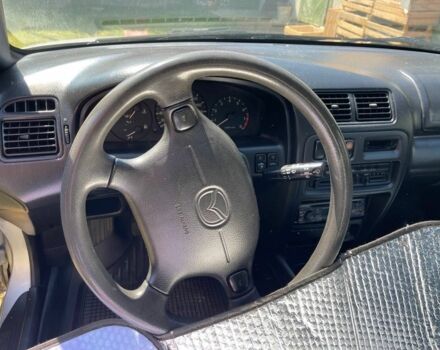 Серый Мазда 323, объемом двигателя 1.5 л и пробегом 137 тыс. км за 2800 $, фото 6 на Automoto.ua