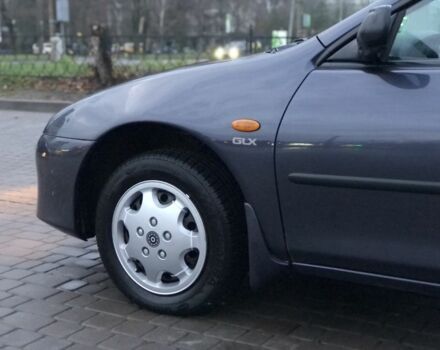 Сірий Мазда 323, об'ємом двигуна 1.5 л та пробігом 200 тис. км за 2500 $, фото 11 на Automoto.ua