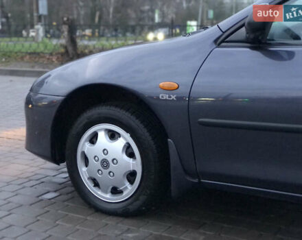 Серый Мазда 323, объемом двигателя 1.5 л и пробегом 199 тыс. км за 2000 $, фото 12 на Automoto.ua