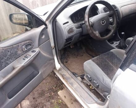 Сірий Мазда 323, об'ємом двигуна 2 л та пробігом 100 тис. км за 500 $, фото 1 на Automoto.ua