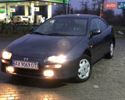 Серый Мазда 323, объемом двигателя 1.5 л и пробегом 199 тыс. км за 2000 $, фото 44 на Automoto.ua