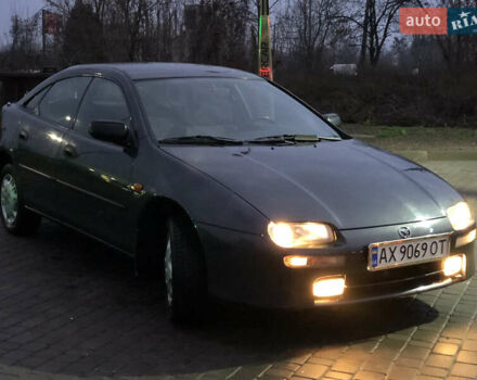 Серый Мазда 323, объемом двигателя 1.5 л и пробегом 199 тыс. км за 2000 $, фото 46 на Automoto.ua