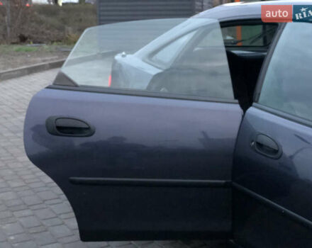 Серый Мазда 323, объемом двигателя 1.5 л и пробегом 199 тыс. км за 2000 $, фото 19 на Automoto.ua