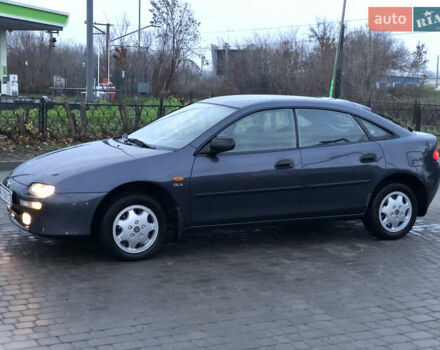 Серый Мазда 323, объемом двигателя 1.5 л и пробегом 199 тыс. км за 2000 $, фото 2 на Automoto.ua