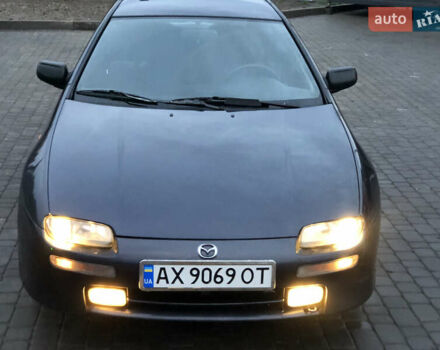 Серый Мазда 323, объемом двигателя 1.5 л и пробегом 199 тыс. км за 2000 $, фото 15 на Automoto.ua